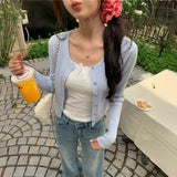 ゴールドボタンケーブルカーディガン