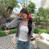 ゴールドボタンケーブルカーディガン