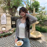 ゴールドボタンケーブルカーディガン