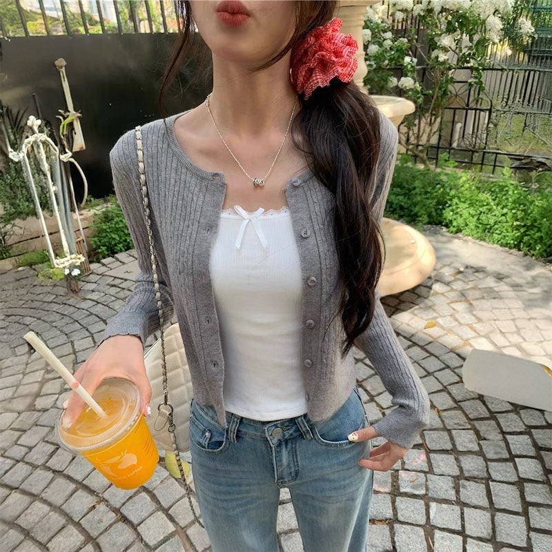 ゴールドボタンケーブルカーディガン