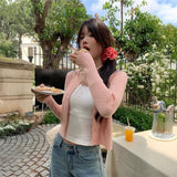 ゴールドボタンケーブルカーディガン