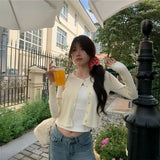 ゴールドボタンケーブルカーディガン