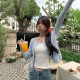 ゴールドボタンケーブルカーディガン