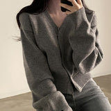 インボタンカーディガン