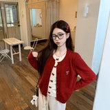 リボンレイヤードニットトップス