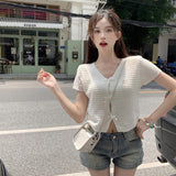 ミニリボンケーブルカーディガン