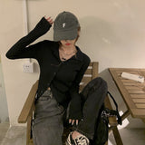 アシンメトリーボタンカーディガン