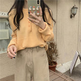 マシュマロボタンネックニット