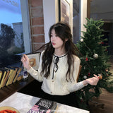 リボンフリルレディライクカーディガン