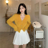 金ボタンモヘアカーディガン