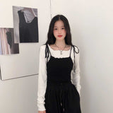 レイヤードウェービートップス