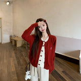 リボンレイヤードニットトップス