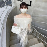 オフショルダーオーガンジートップス