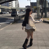 ウェスタンスルーメッシュニット