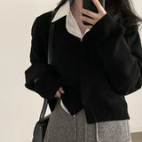 インボタンカーディガン