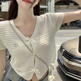 ミニリボンケーブルカーディガン