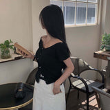 デコルテラインボタントップス