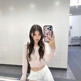 パウダーピンクケーブルニット