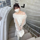 オフショルダーオーガンジートップス