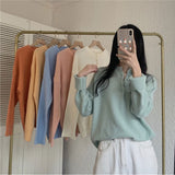 マシュマロボタンネックニット