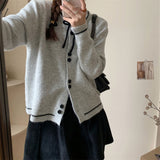 ツインボタンリボンカーディガン