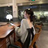 バックリボンモヘアニット