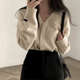 インボタンカーディガン