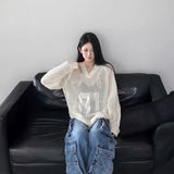 メッシュユニトップス