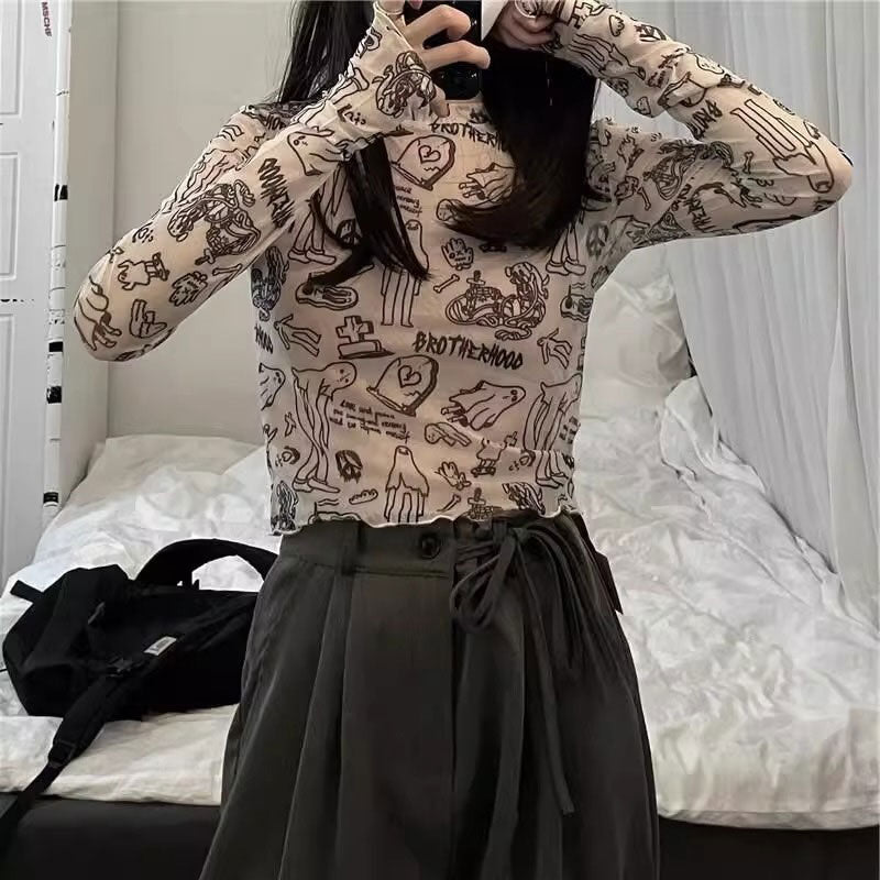 グラフィックシースルートップス