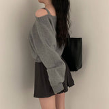 ワンショルダーディープブルーニット