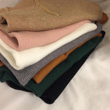 ボタンネックリブトップス