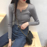 ボタンネックリブトップス