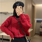 ボタンアクセントケーブルカーディガン