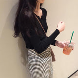 ボタンネックリブトップス