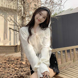 ビジューボウタイリボンブラウス