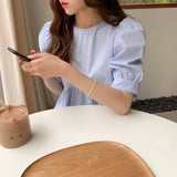 エレガントペプラムブラウス