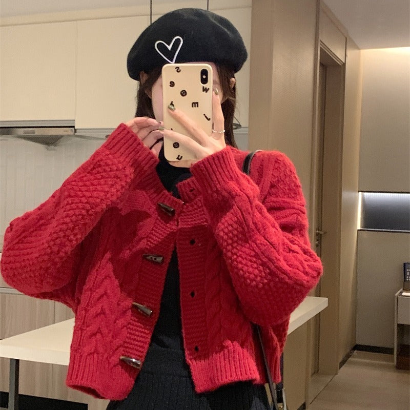 ボタンアクセントケーブルカーディガン