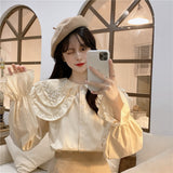 ダブルカラービジューブラウス