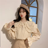 ダブルカラービジューブラウス