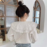 ダブルカラービジューブラウス