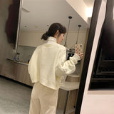 ボタンアクセントケーブルカーディガン