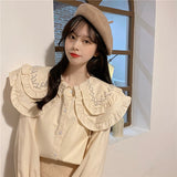 ダブルカラービジューブラウス