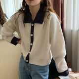 ボタンカラーリブトップス