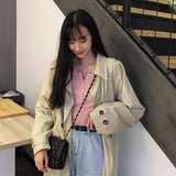 ボタンネックリブトップス