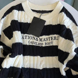 モノトーンダメージニット