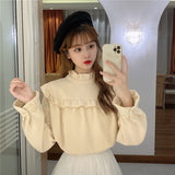 フロントフリルリブトップス