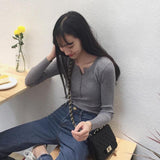 ボタンネックリブトップス