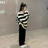 モノトーンダメージニット