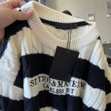 モノトーンダメージニット