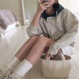 ボタンバイカラーフーディー